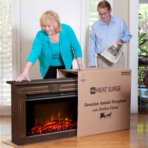 Couple opening an Amish Fireplace in their home