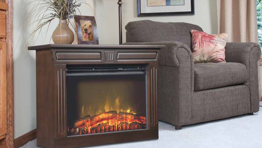 An Amish Fireplace set next to a living room set